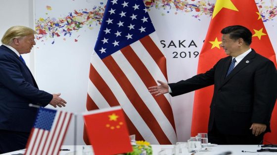 China's President Xi Jinping (R) greets US President Donald Trump before a bilateral meeting on the sidelines of the G20 Summit in Osaka on June 29, 2019. (Photo by Brendan Smialowski / AFP)